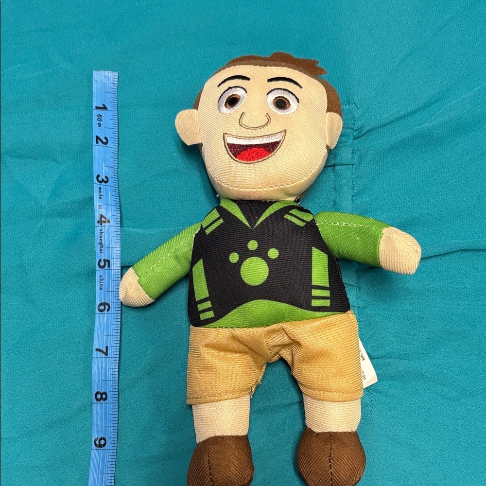 Green and Brown Plush Kid Character Toy - Soft Stuffed Figure